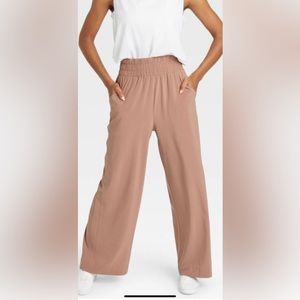 All in motion women stretch woven high rise wide leg pants. Color taupe size S.
